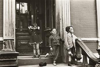 HELEN LEVITT (1913-2009) N.Y. (children in masks).                                                                                               